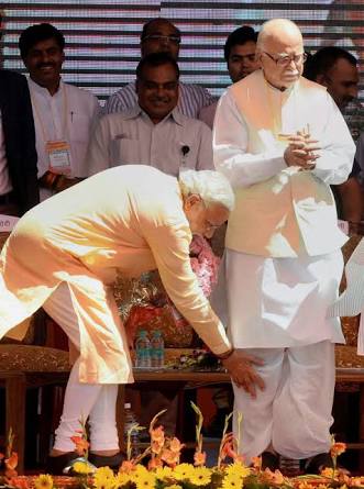 modi touching feet of Advani